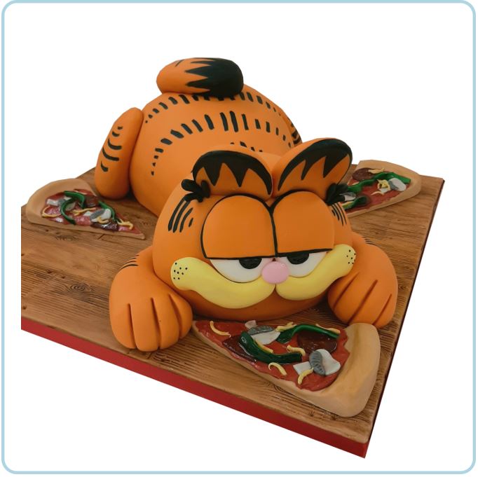 A cake in the shape of Garfield the cat, lying down with eyes half-closed, surrounded by edible models of pizza slices.