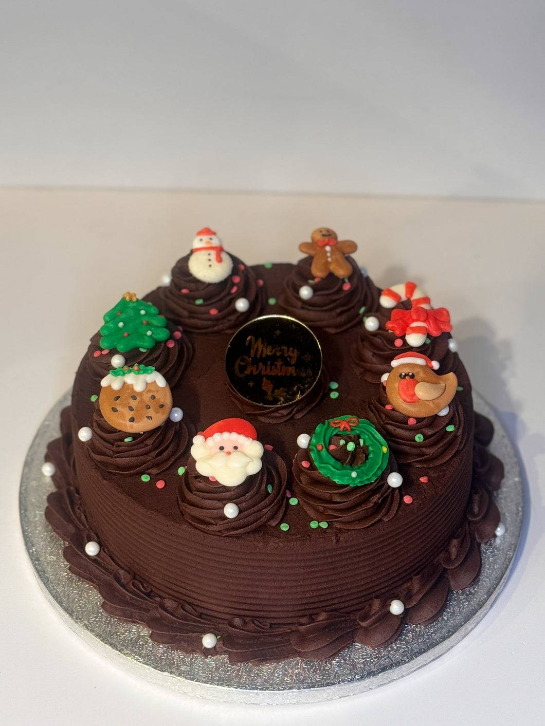 Classic buttercream with Christmas decorations.