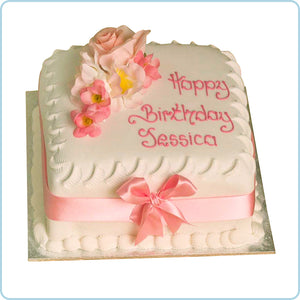 Classic white cake with pretty silk flowers