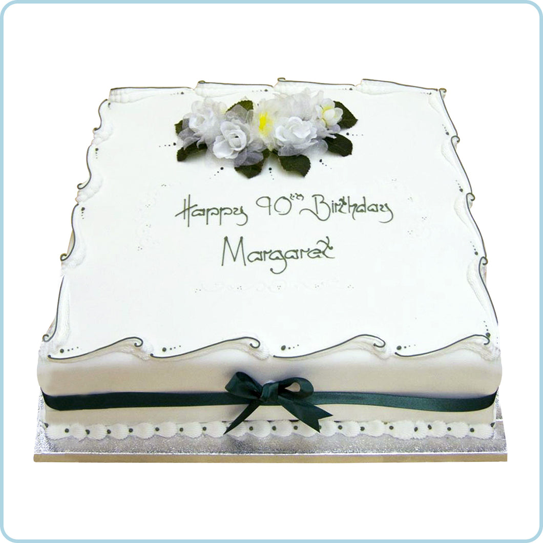 Elegant cake with silk flowers